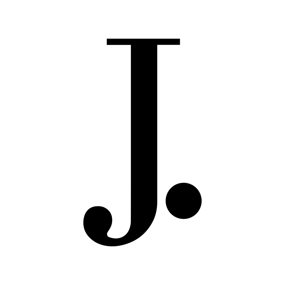 J.